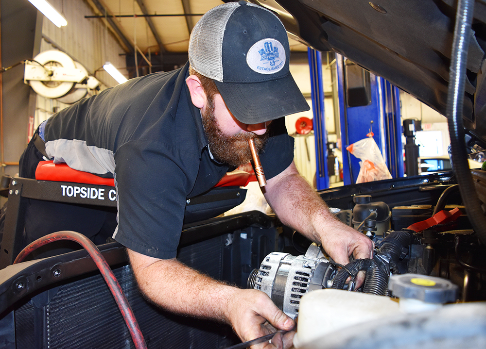 Milton Ruben Chevrolet Certified Technician Travis Baxter installs camshaft lifters in a Chevy Silverado. To schedule your service appointment, visit http://bit.ly/1LiSuFi. #WhatsInTheBay